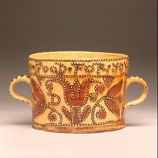 Two-handled cup with inscription and tulip motif