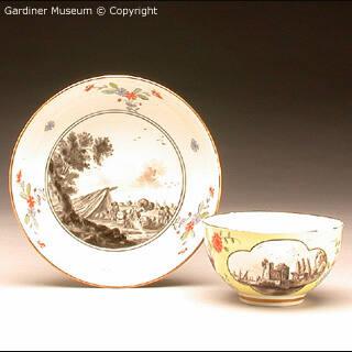 Tea bowl and saucer with harbour scenes