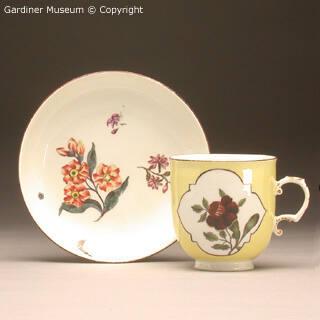 Coffee cup and saucer with flora
