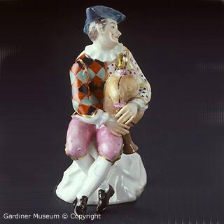 Harlequin with bagpipes