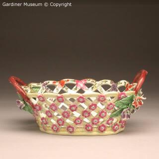 Pair of yellow-ground oval baskets
