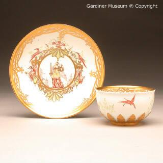 Tea bowl and saucer painted by F.F.Mayer of Pressnitz
