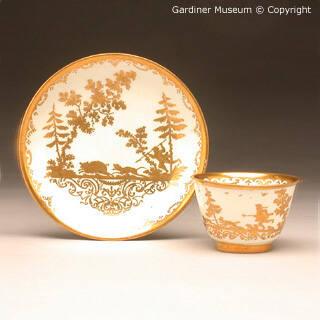 Tea bowl and saucer with hunting scenes painted in the Seuter workshop