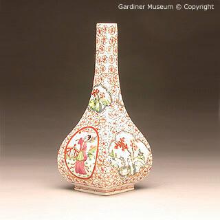 Sake bottle with prunus ground and figures
