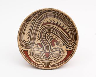 Pedestal dish with serpent design