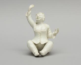 Figure of a seated woman