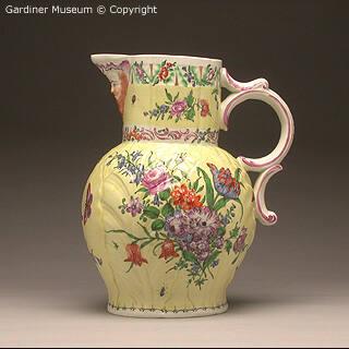 Masked jug, yellow ground with scattered bouquets