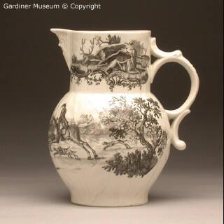 Masked jug with hunting scenes