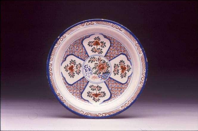 Plate with panelled design