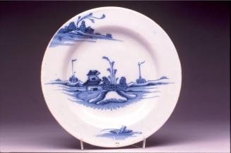 Plate with boats and island