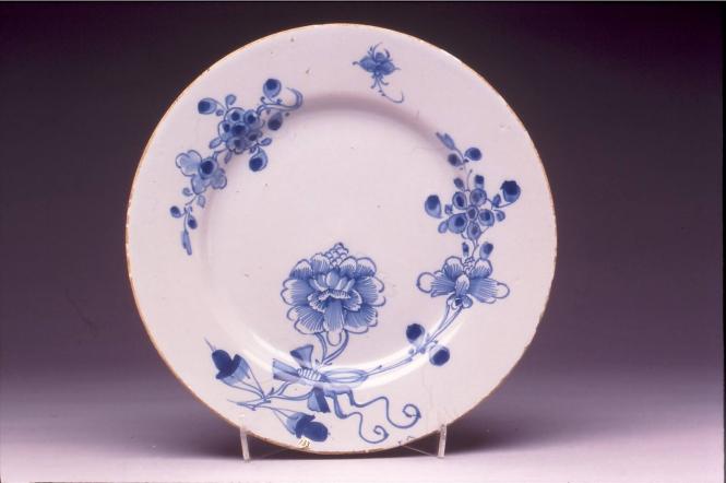 Plate with beribboned peony design