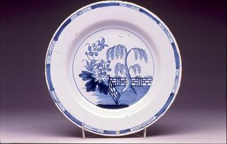 Plate with peony and fence pattern