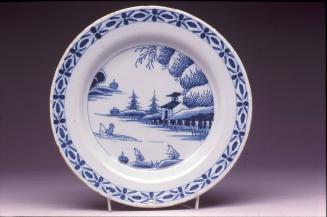 Plate with figure in a boat