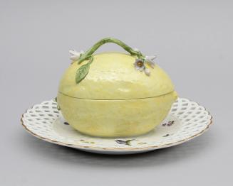 Lemon-form tureen on attached pierced stand