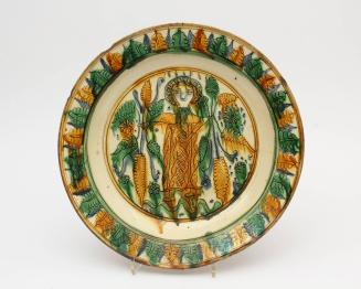 Dish with central figure