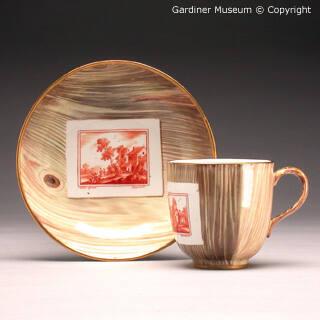 Coffee cup and saucer with "faux bois" pattern