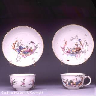 Cup and saucer with ornithological pattern