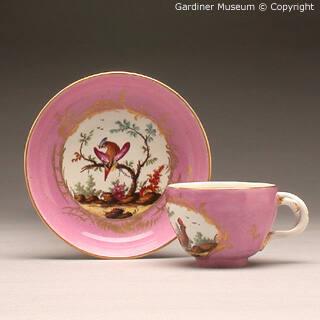 Cup and saucer, pink ground with birds