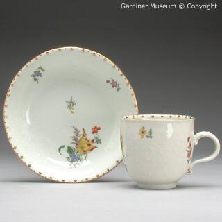Cup and saucer with flowers