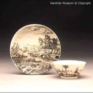 Tea bowl and saucer painted with harbour scene