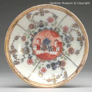 Saucer with scene of house and flowers