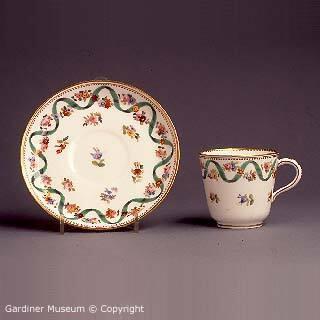 Teacup and saucer with "Albert Green Ribbon" pattern