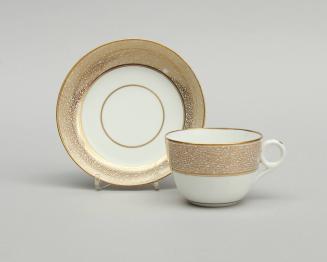 Teacup and saucer with vermicelli pattern