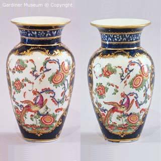 Pair of vases with plants and exotic birds