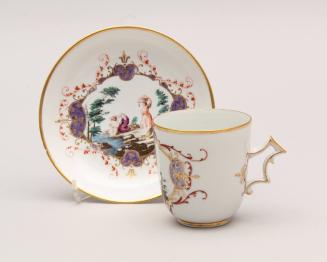 Cup and saucer with peasant scene