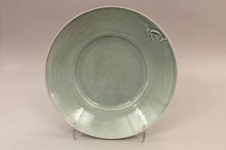 Large celedon plate with whale tail