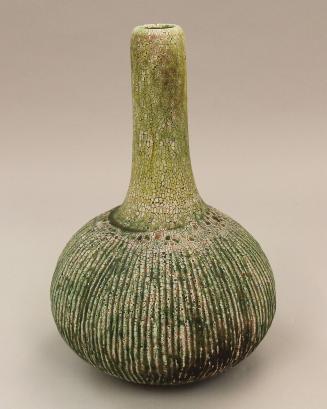 Large green vase with speckled glaze