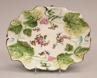 Moulded dish with vines and grapes