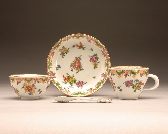 Armorial teacup, coffee cup, spoon and saucer from the Ludlow Service