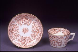 Cup and saucer with printed 'Fibre' pattern