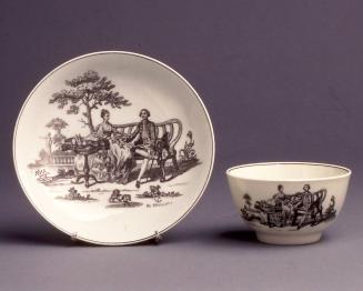 Teabowl and Saucer with “Tea Table” pattern