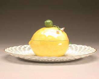 Pair of lemon-form tureens with attached stands