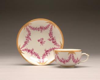 Cup and saucer with garlands
