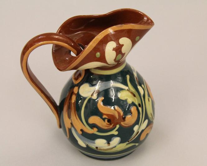 Jug with scroll pattern on blue ground