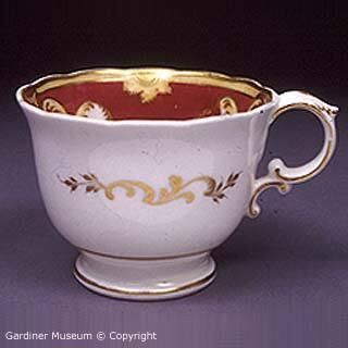 Coffee cup with Rococo Revival design
