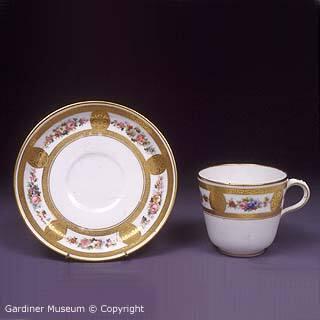 Teacup and saucer with Sèvres style decoration