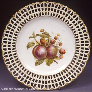Dessert plate, pierced and painted with plums