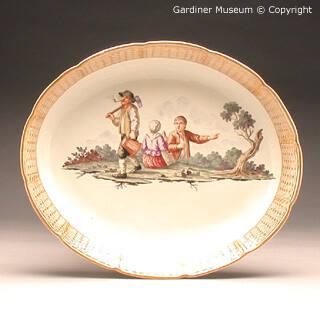 Oval shaped dish with scene of three peasants