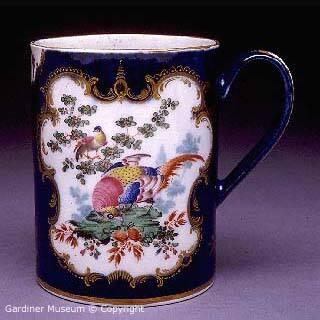 Mug with blue-scale and birds pattern