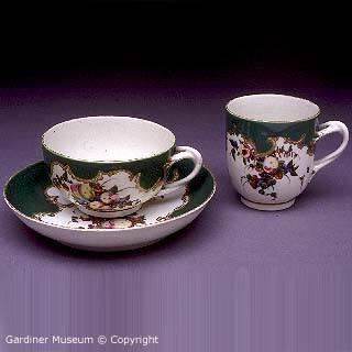 Teacup, coffee cup and saucer