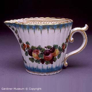 Fluted creamer with floral swags