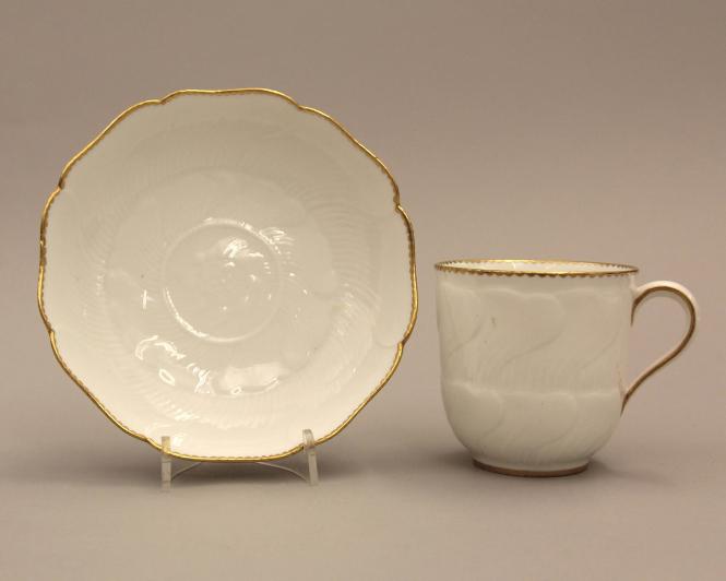 Cup and saucer of lotus form