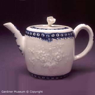 Teapot with embossed floral pattern