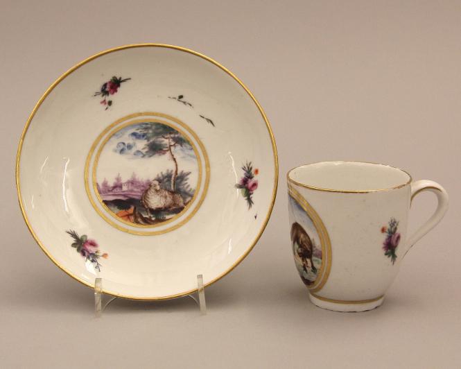 Cup and saucer with Aesop's fables of the wolf and the lamb