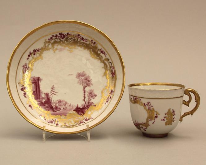 Cup and saucer with Meissen style harbour scenes