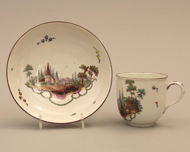 Cup and saucer with landscape